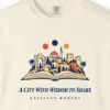 a-city-with-wisdom-to-share-tee-ivory-chest-v1 A City with Wisdom to Share Tee in Ivory, close-up