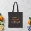 Attalia Adalya Antalya Night design on a black canvas tote, laid flat
