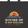 Close-up of the Giving Up Is Not Realism Night design printed on a black canvas tote, with the top seam and handles