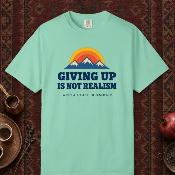 Giving Up Is Not Realism Tee in Island Reef, front view