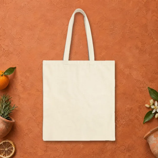 Plain back of the natural canvas tote with the Hüzün design, printed on the front only