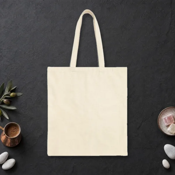 Plain back of the natural canvas tote with the Not as Servers, but as Speakers design, printed on the front only
