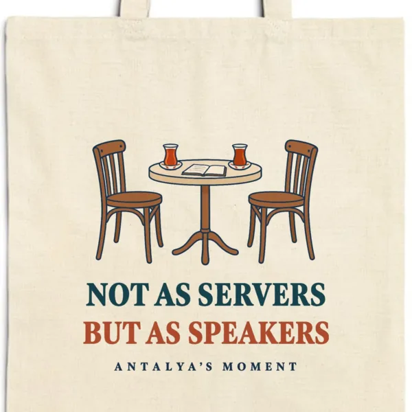 Close-up of the Not as Servers, but as Speakers design printed on a natural canvas tote, with the top seam and handles