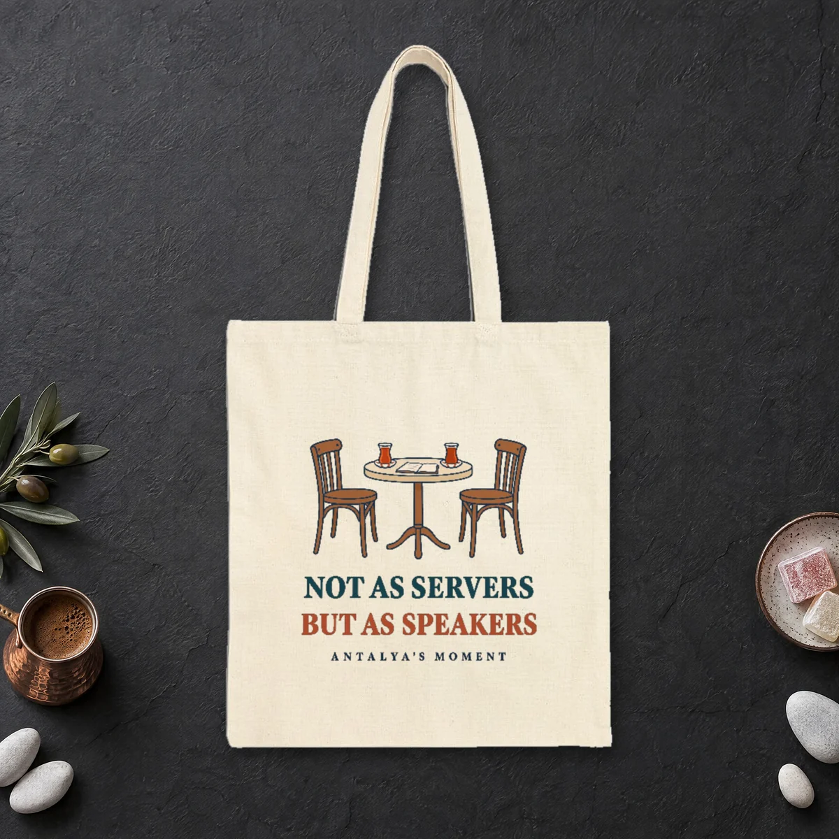 Not as Servers, but as Speakers design on a natural canvas tote, laid flat