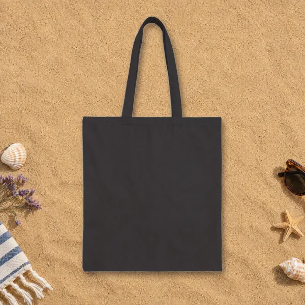 Plain back of the black canvas tote with the Now We Are the Ancestors Night design, printed on the front only