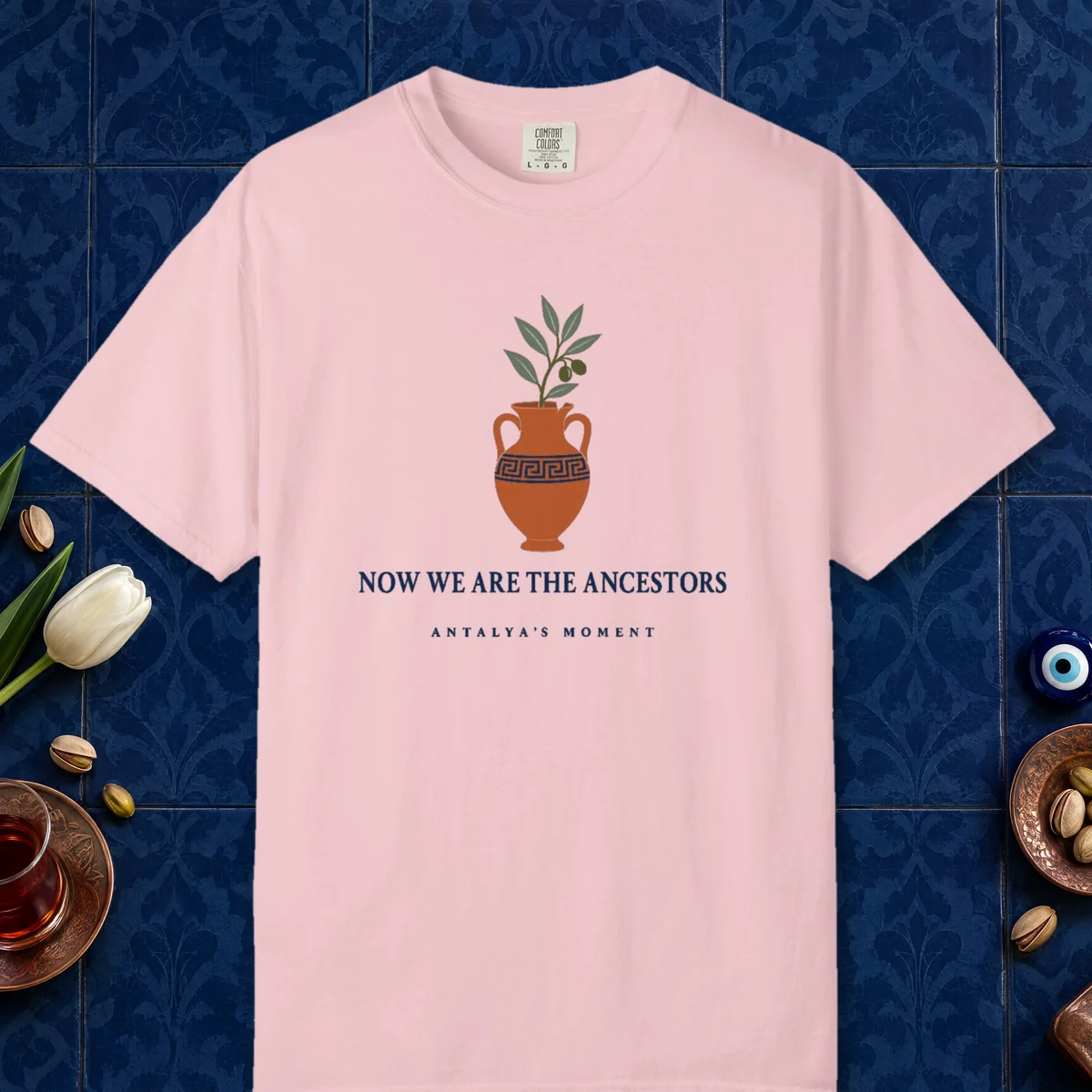 Now We Are the Ancestors Tee in Blossom, front view