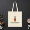 Now We Are the Ancestors design on a natural canvas tote, laid flat