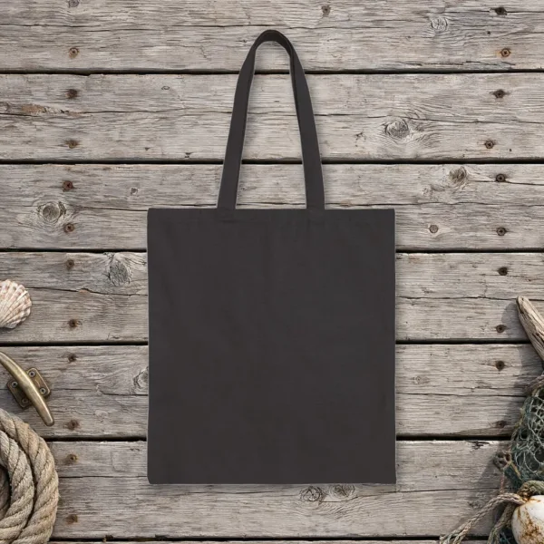 Plain back of the black canvas tote with the The City Beneath the City Night design, printed on the front only