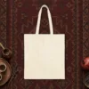 Plain back of the natural canvas tote with the The City Beneath the City design, printed on the front only