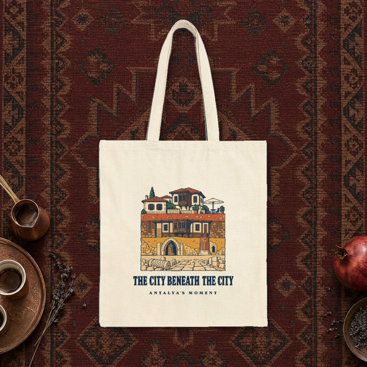 The City Beneath the City design on a natural canvas tote, laid flat