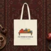 The Wisdom of Enough design on a natural canvas tote, laid flat
