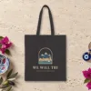 we-will-try-night-tote-black-front-v1 We Will Try Night design on a black canvas tote, laid flat