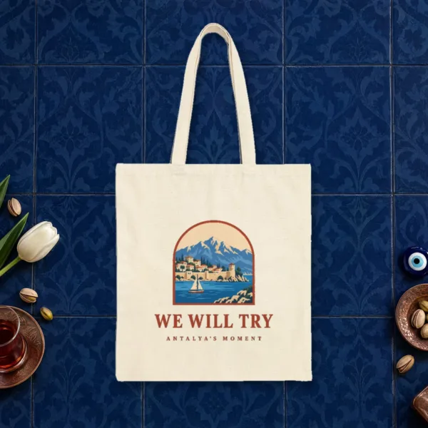 We Will Try design on a natural canvas tote, laid flat