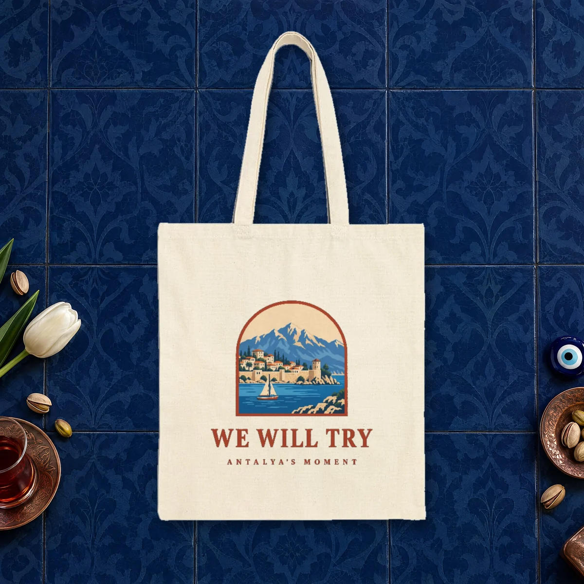 We Will Try design on a natural canvas tote, laid flat